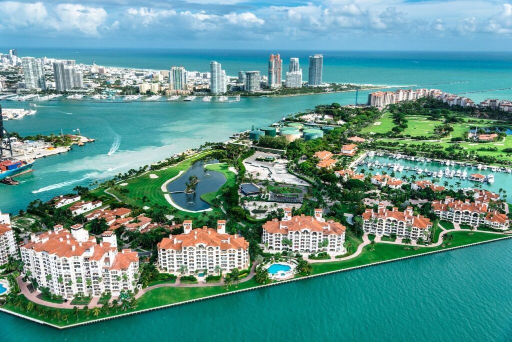 Image of Fisher Island, a barrier island in Miami that is home to some of the most expensive homes in the city. The island is known for its golf course, its luxury homes, and its proximity to downtown Miami.